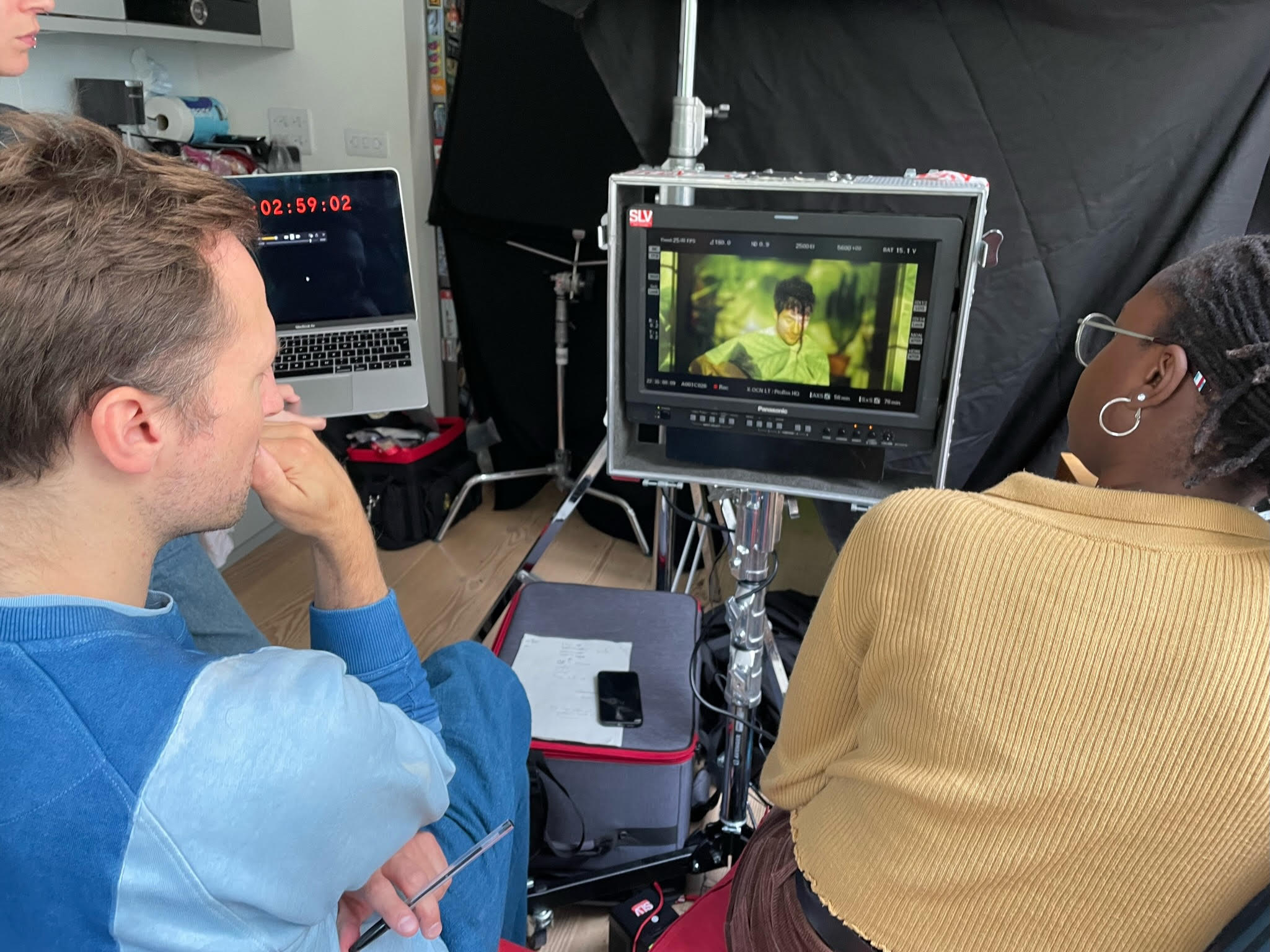 Director Orlando von Einsiedel (left) and production assistant Anta Male (right) on the set of a music video shoot for Bastille's ‘Hope For The Future.’ Courtesy of Grain Media
