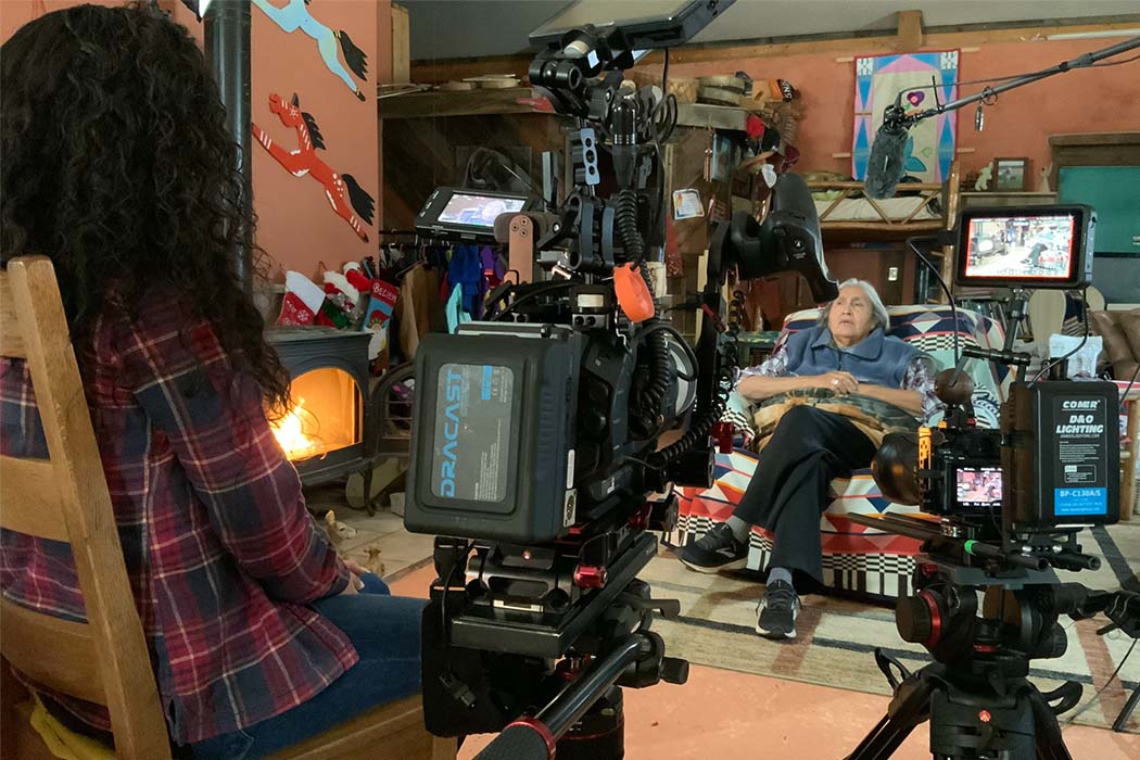 Tsanavi Spoonhunter is a Native American woman seen here interviewing Peggy White Well Known Buffalo, a member of the Crow Tribe of Montana for ‘Crow Country: Our Right to Food Sovereignty.’ Photo courtesy of Tsanavi Spoonhunter.