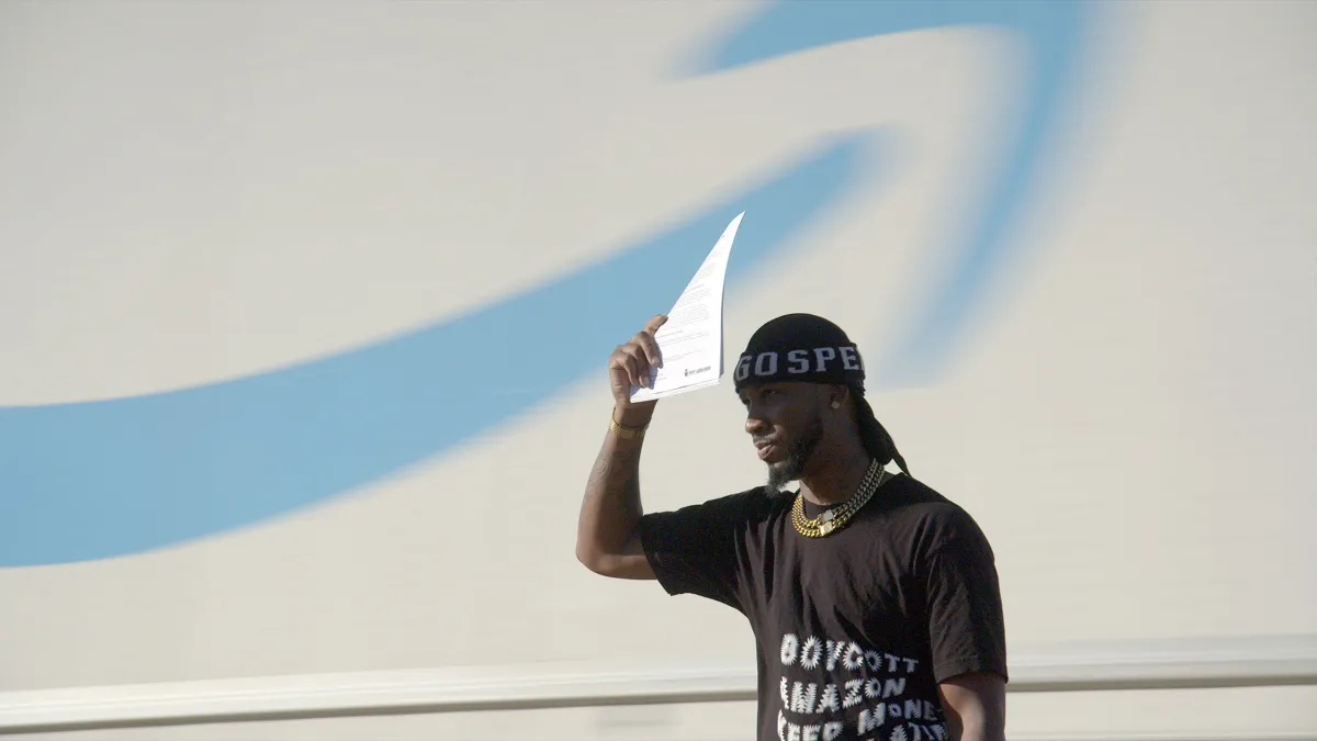 Chris Smalls, wearing a black shirt and black hair wrap, appears in Union by Brett Story and Steve Maing. Courtesy of Sundance Institute. Photo by Martin DiCicco