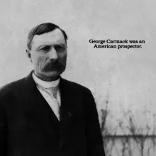 Black and white photograph of a serious-looking white male. "George Carmack was an American prospector."